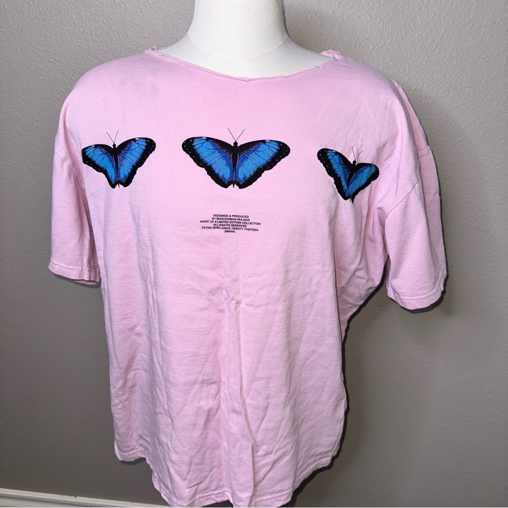 Pink Distressed T-Shirt with Blue Butterfly Design
